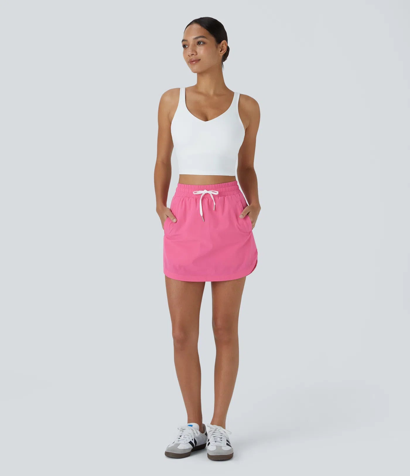 Spódniczka golfowa mini 2 w 1 z wysokim stanem, sznurkiem, kieszeniami i zaokrąglonym dołem